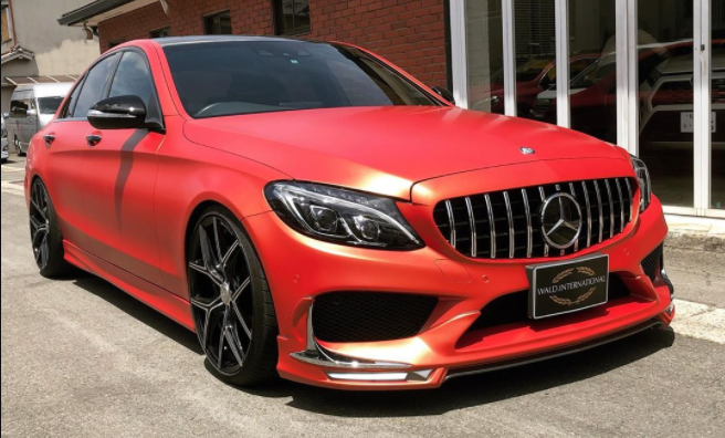 car performance modifications on a red Mercedes Benz